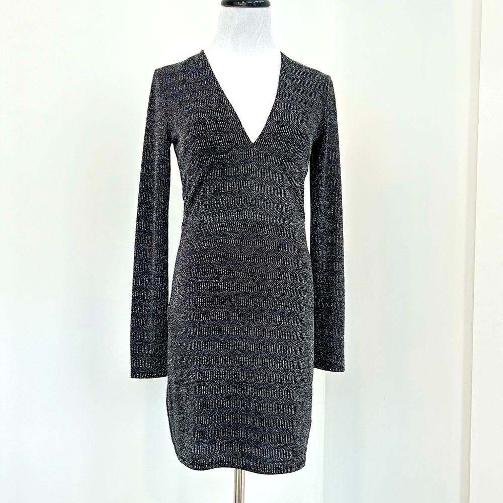 Dress by “Sugar +Lips” stretch and slightly shiny.
